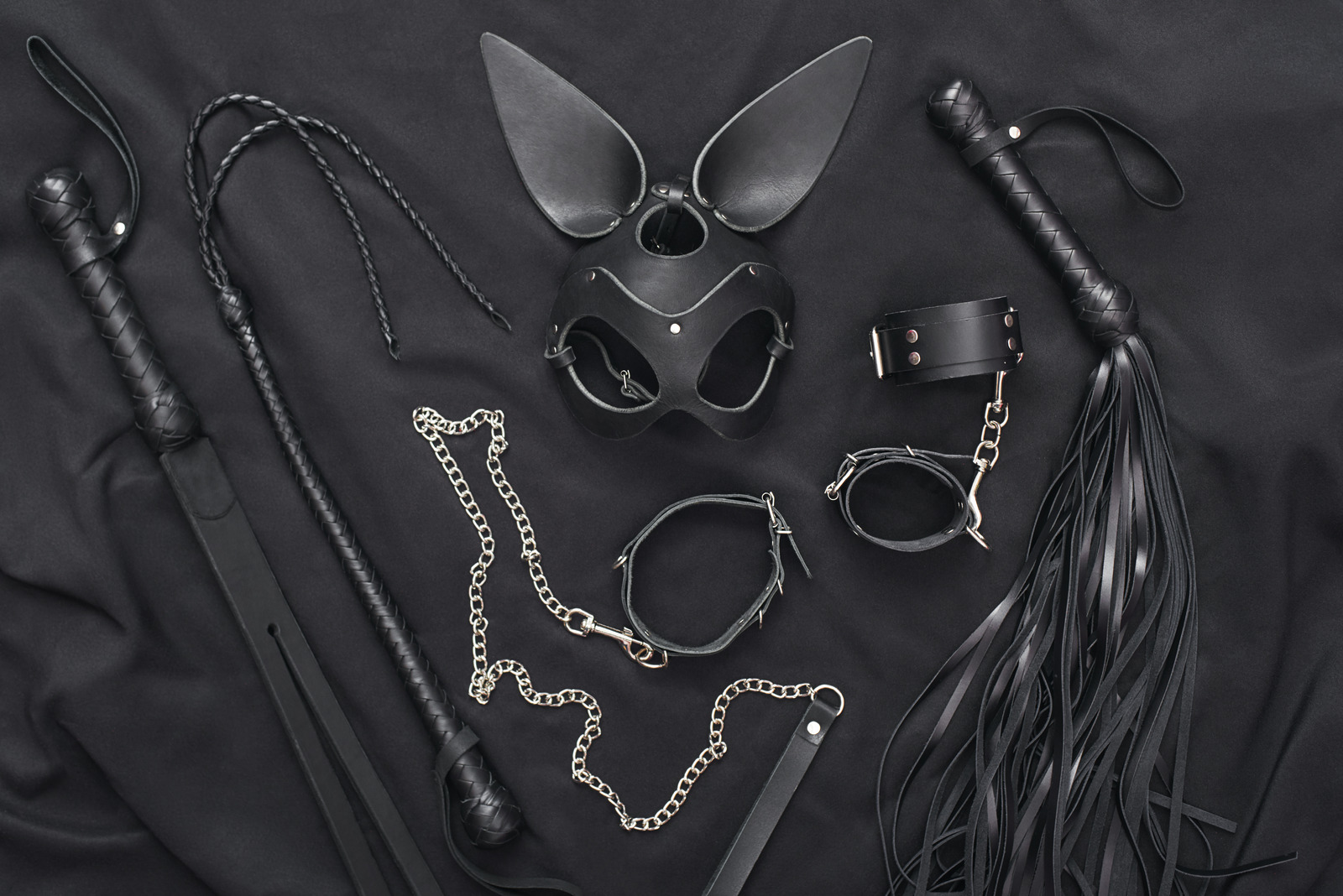 Explore The World Of Kinky Play Top View Of Bdsm Leather Kit Whips